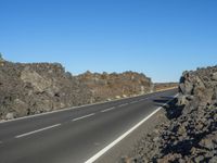 Rural Road in Europe: Clear Sky and Low Mountain