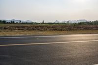 Rural Road in Thailand Mountain Grass Field 001