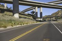 Rural Road Under Concrete Bridge in Los Angeles