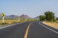 Rural Thailand Road: Yellow Field and Scenic Landscape