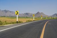 Rural Thailand Road: Yellow Field and Scenic Landscape