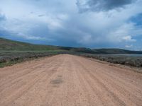 Rural Utah Landscape: Straight Road amidst Natural Beauty