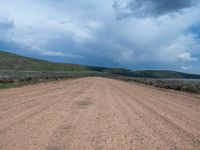 Rural Utah Landscape: Straight Road amidst Natural Beauty