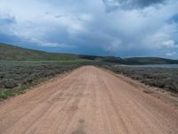 Rural Utah Landscape: Straight Road amidst Natural Beauty