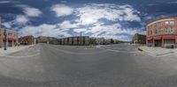 an image of the view from a fish eye lens that includes the street and buildings