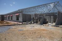 the building is covered in metal sheets to protect it from being struck by the wind