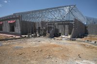 the building is covered in metal sheets to protect it from being struck by the wind