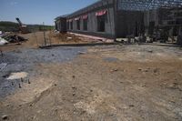 the building is covered in metal sheets to protect it from being struck by the wind