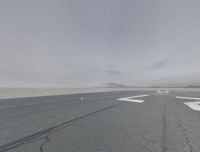 Salt Flats of Utah at Dawn: Rugged Beauty Under Grey Skies