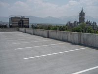 a parking lot and wall are pictured in a photo from the perspective point of view