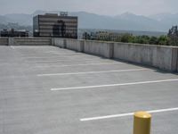 a parking lot and wall are pictured in a photo from the perspective point of view