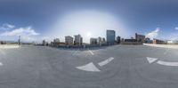 this is an image of a circular fish eye view of buildings in the city skyline