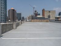 a parking lot and wall are pictured in a photo from the perspective point of view