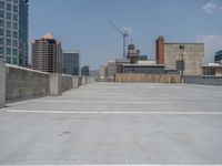 a parking lot and wall are pictured in a photo from the perspective point of view