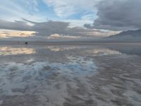 Salt Lake: Mirror Reflection in the Grey Desert Sky