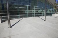 a building with glass walls and balustle balustles on it's side