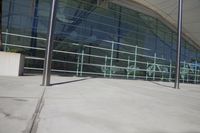 a building with glass walls and balustle balustles on it's side