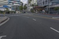 empty streets are seen in this city setting on an overcast day in san diego, california