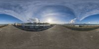 a fish - eye lens reflection is shown in a very wide angle view of the city