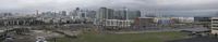 this is an image of a cityscape taken from the hill behind it of a view