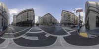 fisheye image of intersection in residential area with street signs on both sides of the street