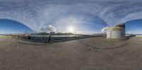 a fish eye view of a large bridge over the ocean from the side of the water