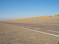 Sand Dune Slope: A Beach Horizon View