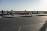 a man riding a skateboard up the side of a ramp in an empty parking lot