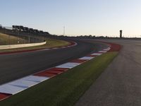 A Scenic Asphalt Road with Clear Skies: Perfect for Racing