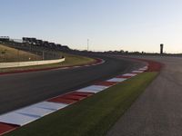 A Scenic Asphalt Road with Clear Skies: Perfect for Racing