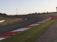 A Scenic Asphalt Road with Clear Skies: Perfect for Racing