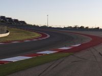 A Scenic Asphalt Road with Clear Skies: Perfect for Racing