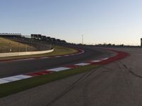 A Scenic Asphalt Road with Clear Skies: Perfect for Racing