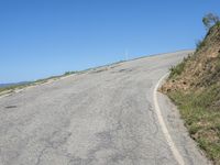 Scenic California Landscape with Curving Road and Blue Sky