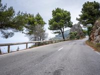 Scenic Coastal Road in Spain: Mountain and Ocean Views