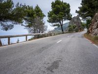 Scenic Coastal Road in Spain - Mountain and Ocean Views