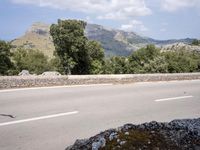 Scenic Coastal Road in Spain Overlooking the Ocean and Mountains