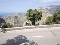 Scenic Coastal Road in Spain Overlooking the Ocean and Mountains