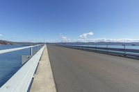 Scenic Coastal Road with Guard Rail: Exploring the Ocean