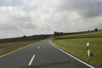 Scenic Country Road: Asphalts and Grass