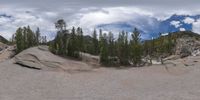 an 360 - turn photo shows a mountain and a wide road between two arrows the way forward