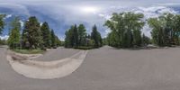 an 360 - turn photo shows a mountain and a wide road between two arrows the way forward