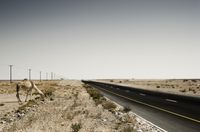 Scenic Desert Road with Mountain Range View