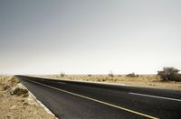 Scenic Desert Road with Mountain Range View