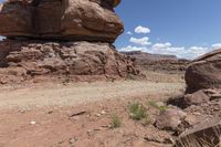 the dirt road leads through the barren terrain of the mountains at valley of fire state park