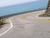 Scenic Drive along California Coast with Clear Sky and Ocean