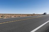 Scenic Drive on Low Desert Road with Red Rock
