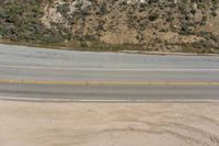 Scenic Drive on Pacific Coast Highway with Mountain Pass View