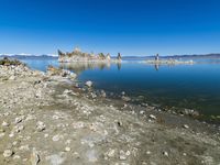 Scenic Mountain Landscape with Sandy Beach and Clear Sky