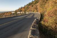 Scenic Mountain Road in USA on a Clear Day with Autumn Landscape